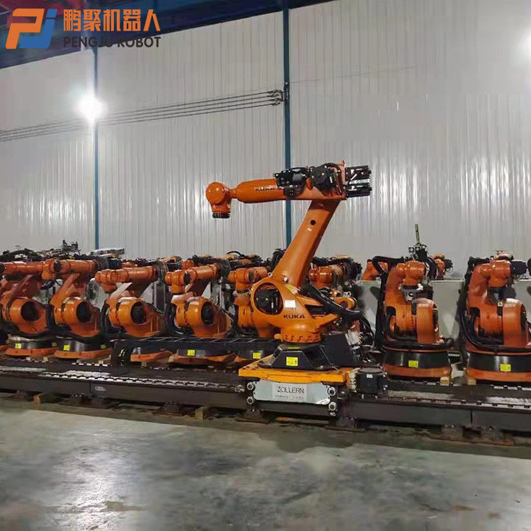 KUKA KR210-2 لحام نقطة ، صيانة الصحافة ، تحميل اللوحات ، تحميل وتفريغ الأجزاء ، معالجة ، معالجة الأجزاء